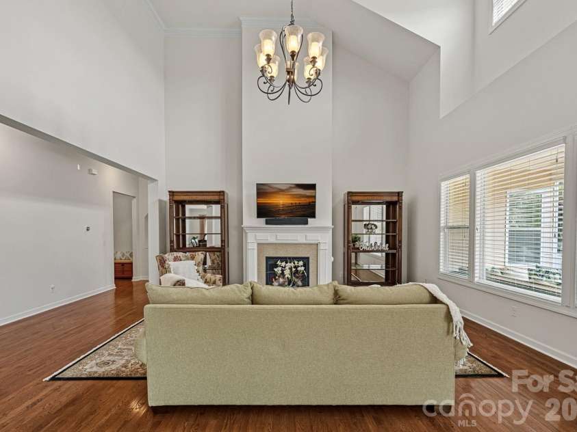 10654 Rippling Stream Drive, Concord, NC 28027.  MLS# CAR4387209, YatesRealty ID 33670. Dramatic GR w/vaulted ceiling