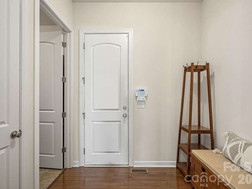 10654 Rippling Stream Drive, Concord, NC 28027.  MLS# CAR4387209, YatesRealty ID 33670. Drop Zone area from Garage