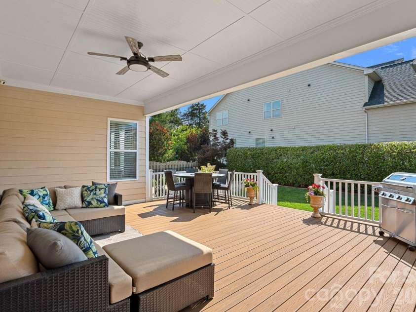 10654 Rippling Stream Drive, Concord, NC 28027.  MLS# CAR4387209, YatesRealty ID 33670. Entertain inside or out on Back Covered porch
