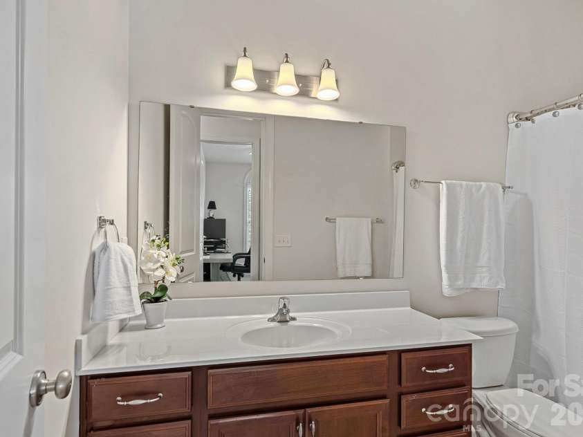 10654 Rippling Stream Drive, Concord, NC 28027.  MLS# CAR4387209, YatesRealty ID 33670. Guest Bath