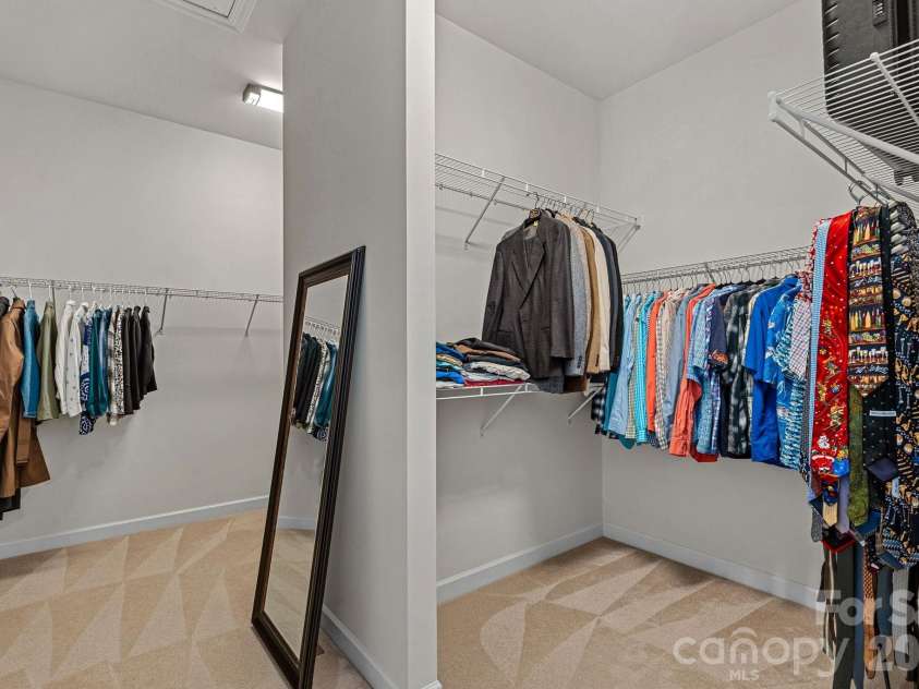 10654 Rippling Stream Drive, Concord, NC 28027.  MLS# CAR4387209, YatesRealty ID 33670. Primary Double sided closet