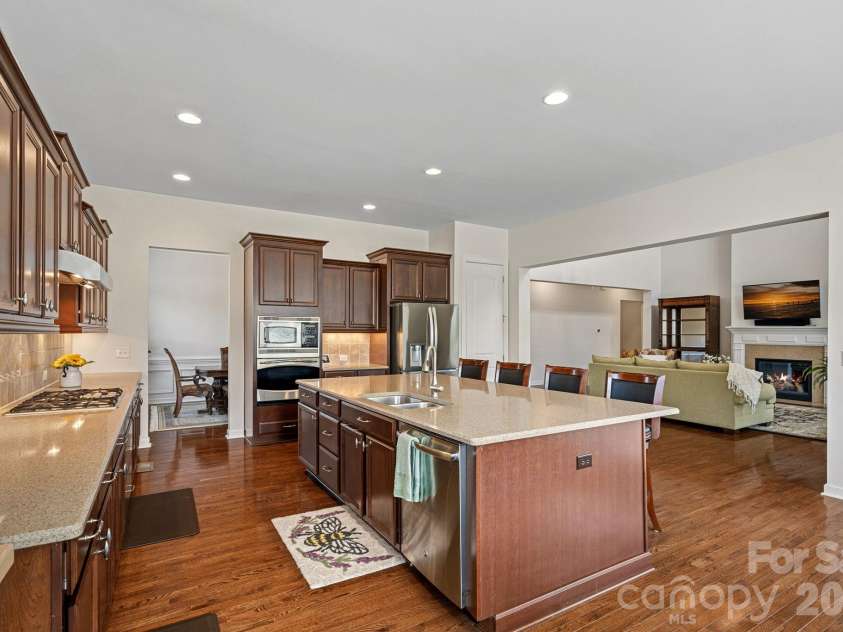 10654 Rippling Stream Drive, Concord, NC 28027.  MLS# CAR4387209, YatesRealty ID 33670. Quartz Countertops & large Kitchen island
