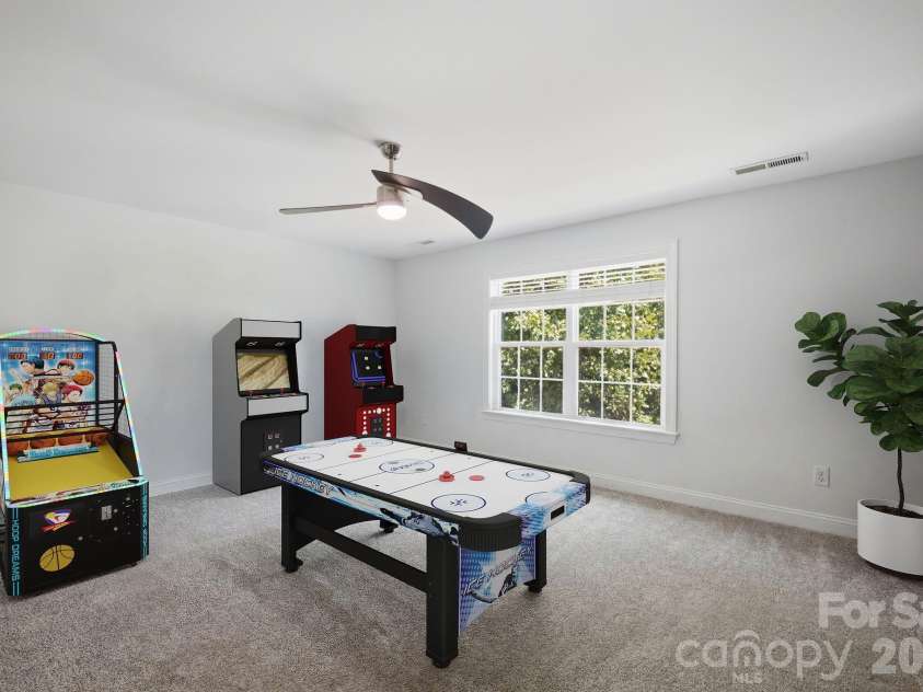 983 Jerry Lees Way, Denver, NC 28037.  MLS# CAR4394495, YatesRealty ID 33679. 4th bedroom AI virtually staged into game room