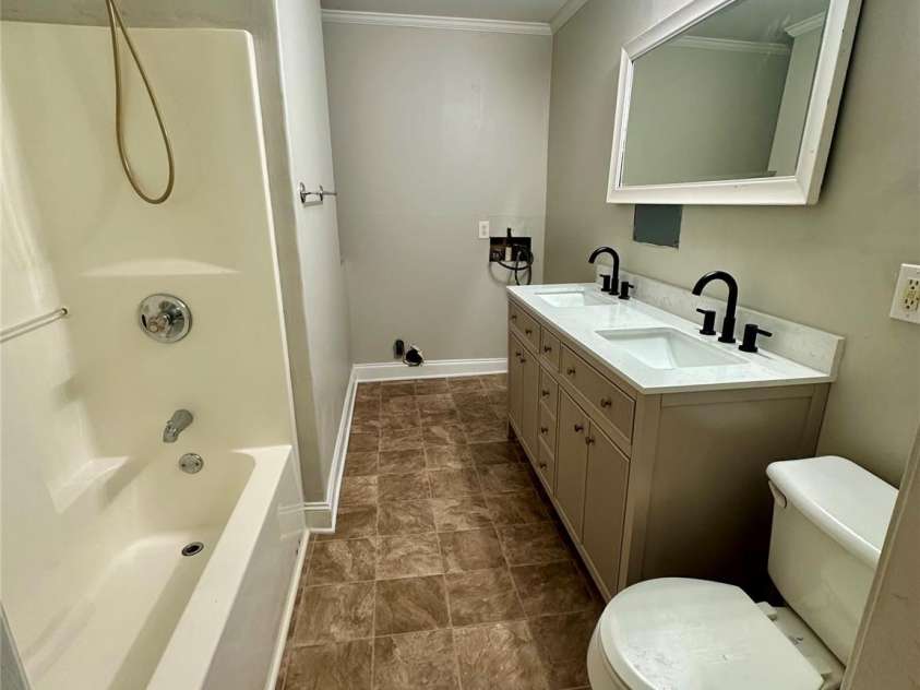 1003 Oak Hill Drive, Monroe, NC 28112.  MLS# CAR4225287, YatesRealty ID 3368. Detached Shed bathroom