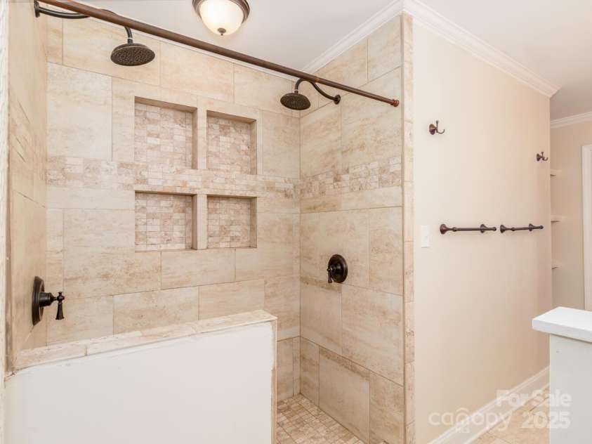 1003 Oak Hill Drive, Monroe, NC 28112.  MLS# CAR4225287, YatesRealty ID 3368. PRIMARY BATH DUAL SHOWER HEADS