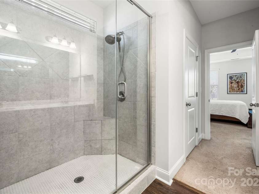 1009 Kemp Road, Indian Trail, NC 28079.  MLS# CAR4273624, YatesRealty ID 33685. Primary bath with tile shower