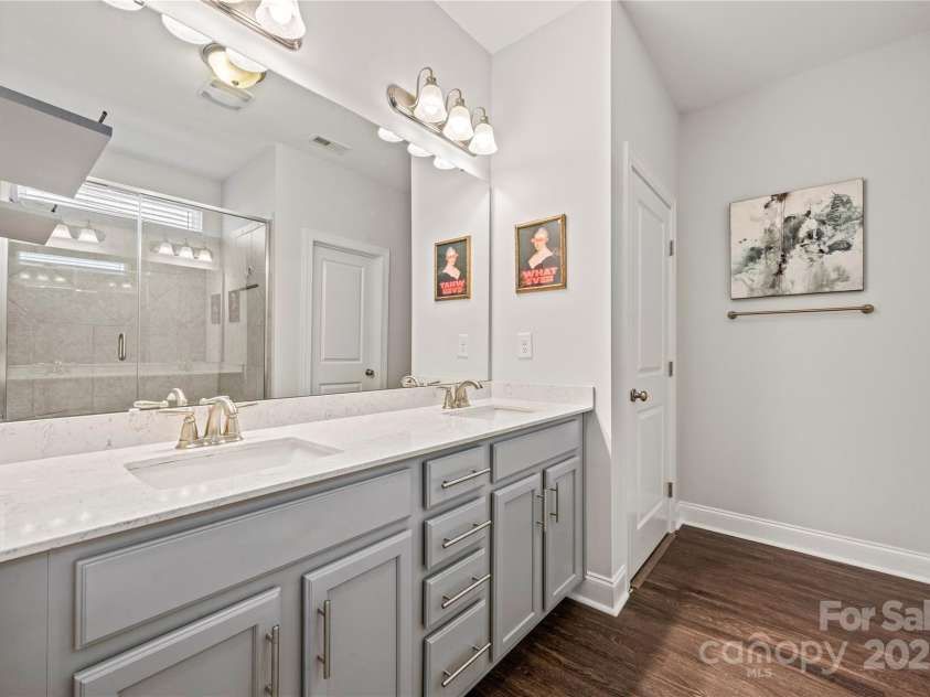 1009 Kemp Road, Indian Trail, NC 28079.  MLS# CAR4310158, YatesRealty ID 33685. Large vanity in primary bath 
