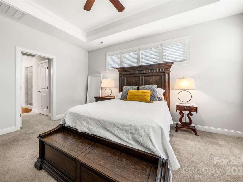 1009 Kemp Road, Indian Trail, NC 28079.  MLS# CAR4310158, YatesRealty ID 33685. Primary suite with tray ceiling 