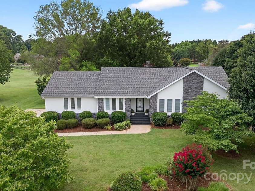 110 Old Squaw Road, Mooresville, NC 28117.  MLS# CAR4278838, YatesRealty ID 33687. Custom Built Residence on the 17th hole of Lake Norman Golf Club