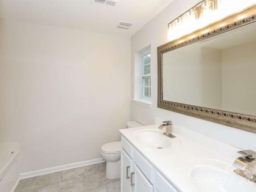 128 Edgington Street, Mooresville, NC 28115.  MLS# CAR4288976, YatesRealty ID 33690. 
