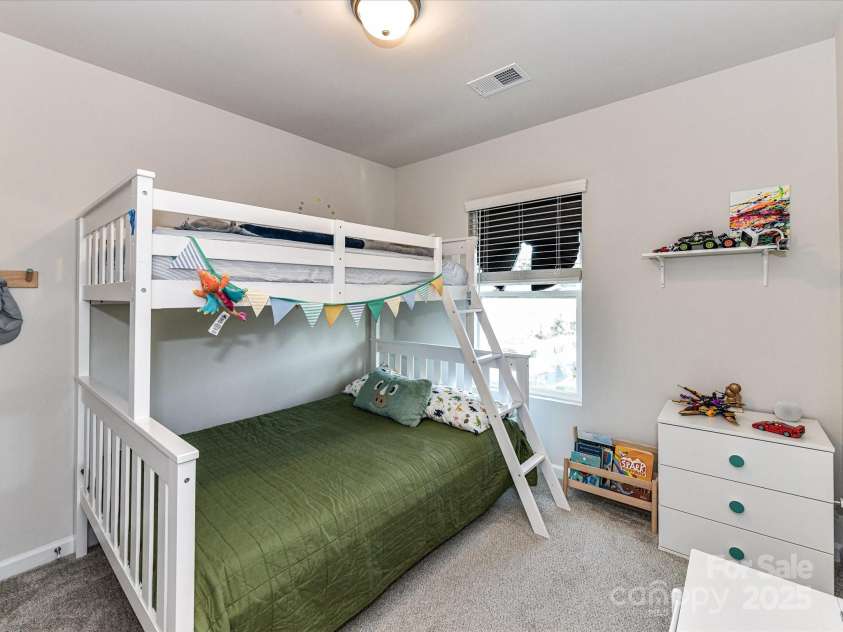 2313 Lazette Drive, Charlotte, NC 28216.  MLS# CAR4291354, YatesRealty ID 33693. Bedroom 3 on 3rd level!