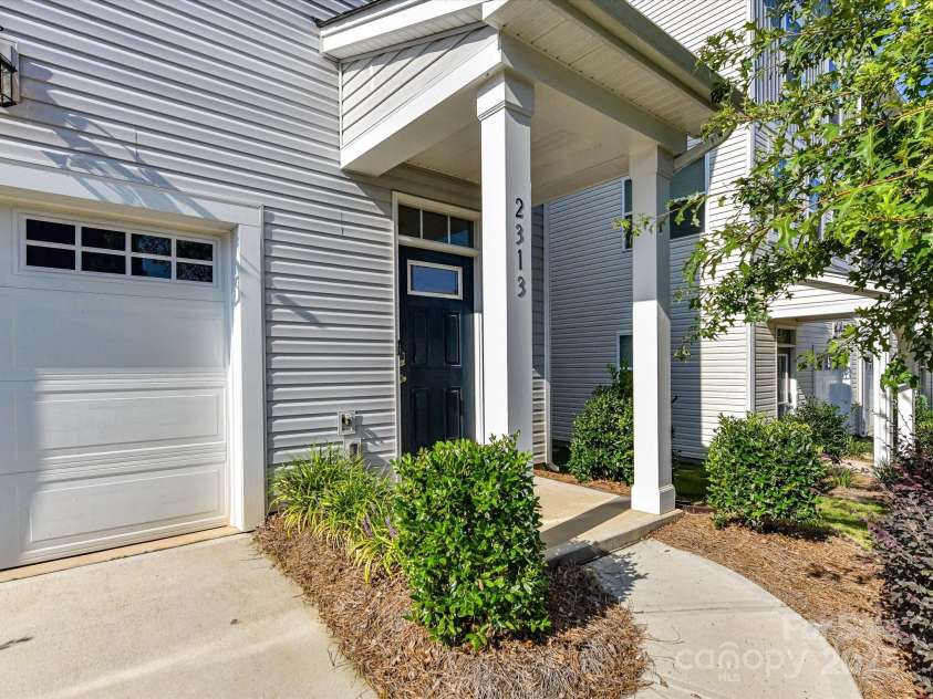 2313 Lazette Drive, Charlotte, NC 28216.  MLS# CAR4291354, YatesRealty ID 33693. Covered Entry!