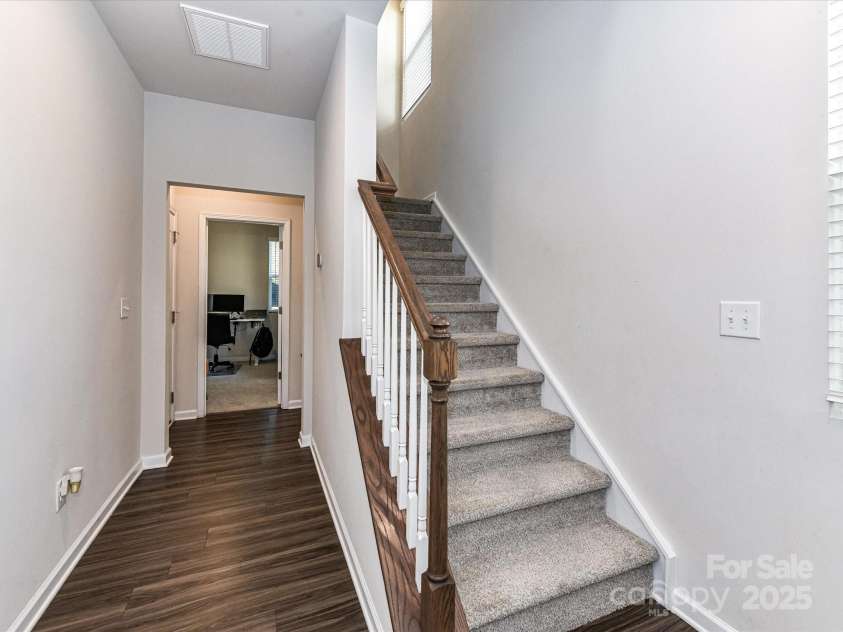 2313 Lazette Drive, Charlotte, NC 28216.  MLS# CAR4291354, YatesRealty ID 33693. Staircase to 2nd level!