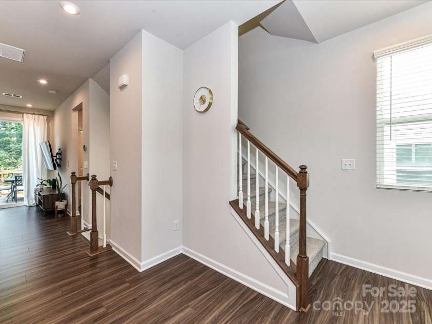 2313 Lazette Drive, Charlotte, NC 28216.  MLS# CAR4291354, YatesRealty ID 33693. Staircase to 3rd level!