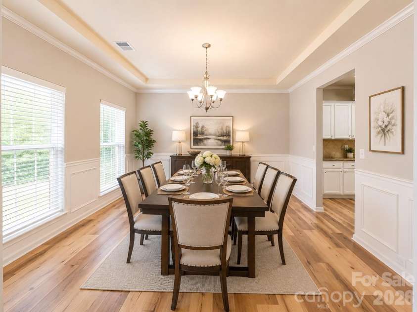 4857 Annelise Drive, Harrisburg, NC 28075.  MLS# CAR4392281, YatesRealty ID 33697. Formal dining Virtual staging
