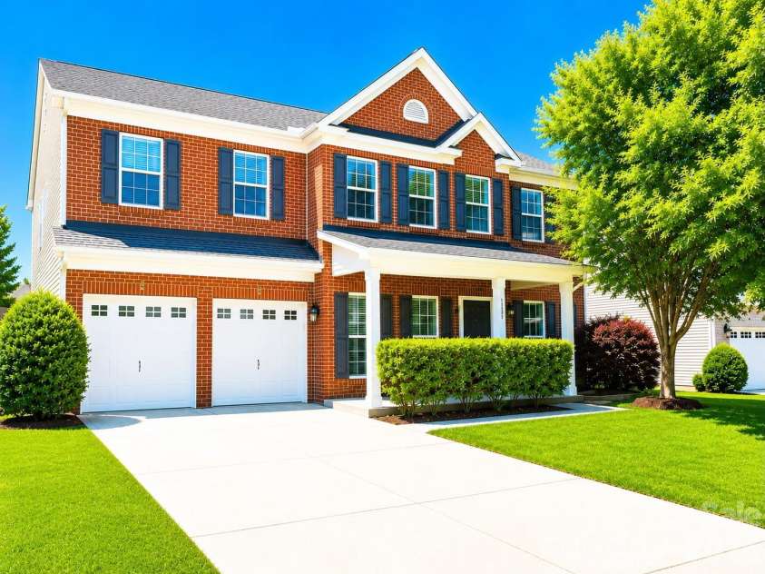 4857 Annelise Drive, Harrisburg, NC 28075.  MLS# CAR4392281, YatesRealty ID 33697. Front with full brick