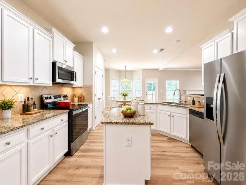 4857 Annelise Drive, Harrisburg, NC 28075.  MLS# CAR4392281, YatesRealty ID 33697. Kitchen Virtual staging