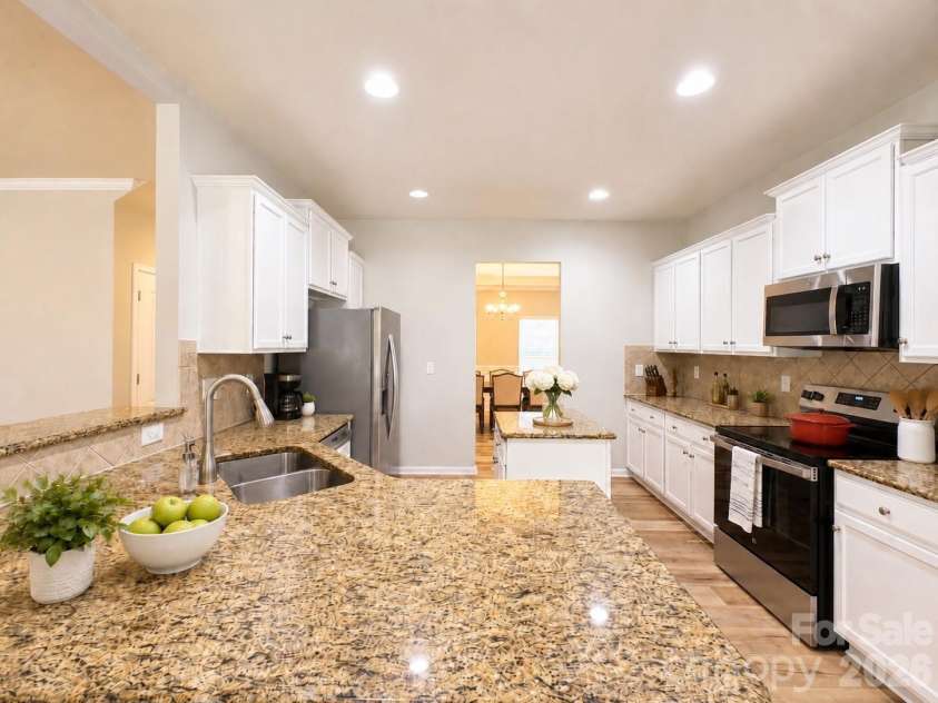4857 Annelise Drive, Harrisburg, NC 28075.  MLS# CAR4392281, YatesRealty ID 33697. Kitchen Virtual staging