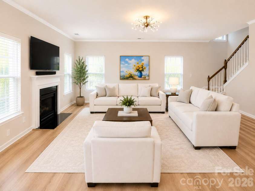 4857 Annelise Drive, Harrisburg, NC 28075.  MLS# CAR4392281, YatesRealty ID 33697. Living room Virtual staging