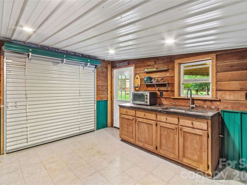 215 Meadow Lake Drive, Salisbury, NC 28146.  MLS# CAR4291335, YatesRealty ID 33699. Garage door.