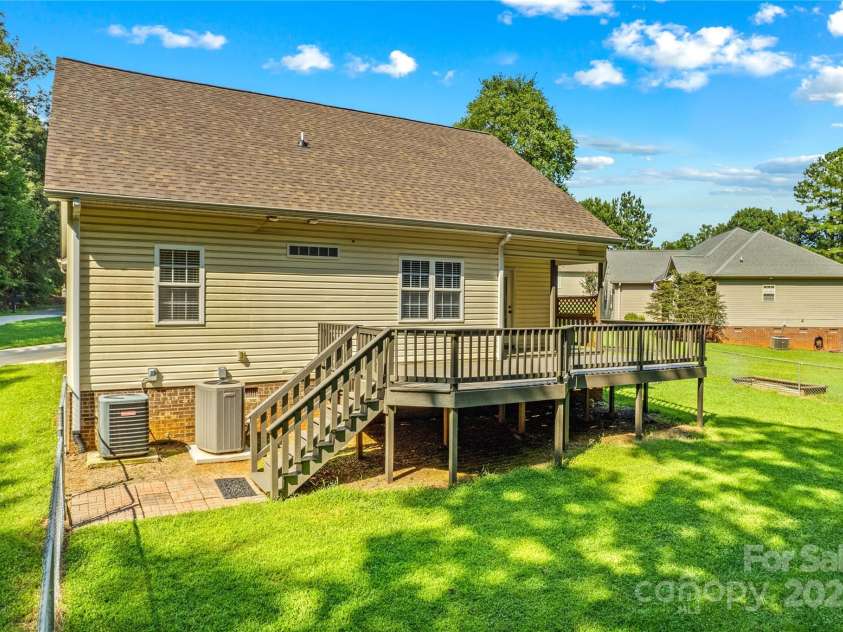 215 Meadow Lake Drive, Salisbury, NC 28146.  MLS# CAR4291335, YatesRealty ID 33699. Stairs to backyard or gate to sideyard