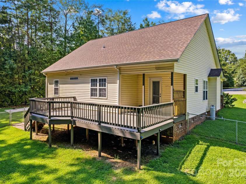 215 Meadow Lake Drive, Salisbury, NC 28146.  MLS# CAR4291335, YatesRealty ID 33699. The deck has a 50amp outlet to hook up to a generator or EV charging cord.