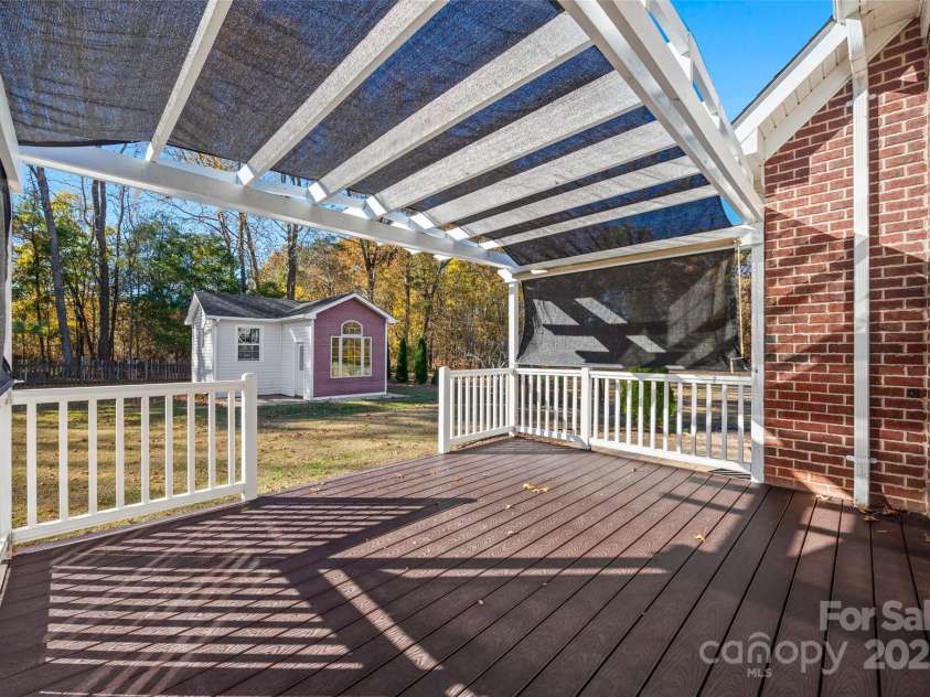 5916 Newell Drive, Monroe, NC 28112.  MLS# CAR4320671, YatesRealty ID 337. DECK WITH PERGOLA