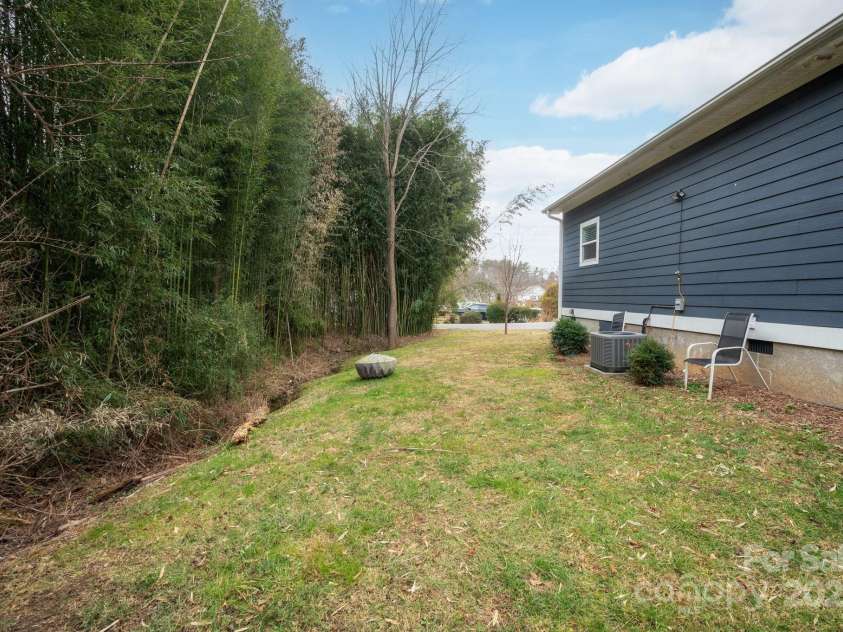 140 Liberty Street, Asheville, NC 28803.  MLS# CAR4219149, YatesRealty ID 3370. Small Creek in the Backyard (Never Breached Banks During Helene!)