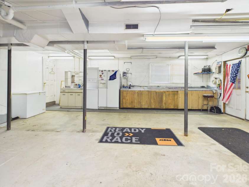 19 Pinecrest Court, Taylorsville, NC 28681.  MLS# CAR4388793, YatesRealty ID 33705. Workshop/Basement