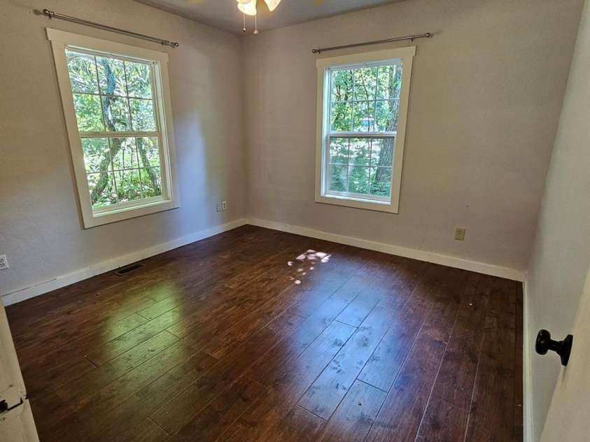 100 Squirrel Lane, Sapphire, NC 28774.  MLS# CAR4395796, YatesRealty ID 33707. 