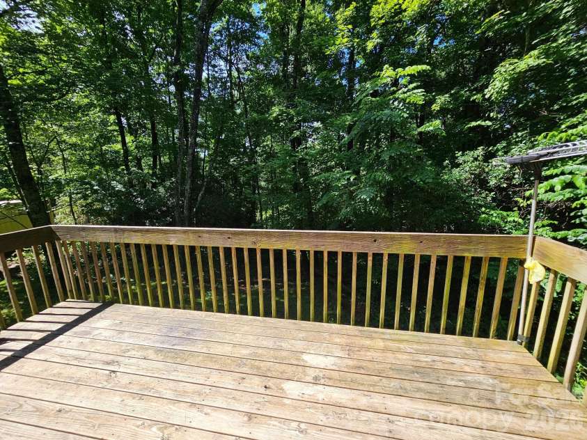 100 Squirrel Lane, Sapphire, NC 28774.  MLS# CAR4395796, YatesRealty ID 33707. 