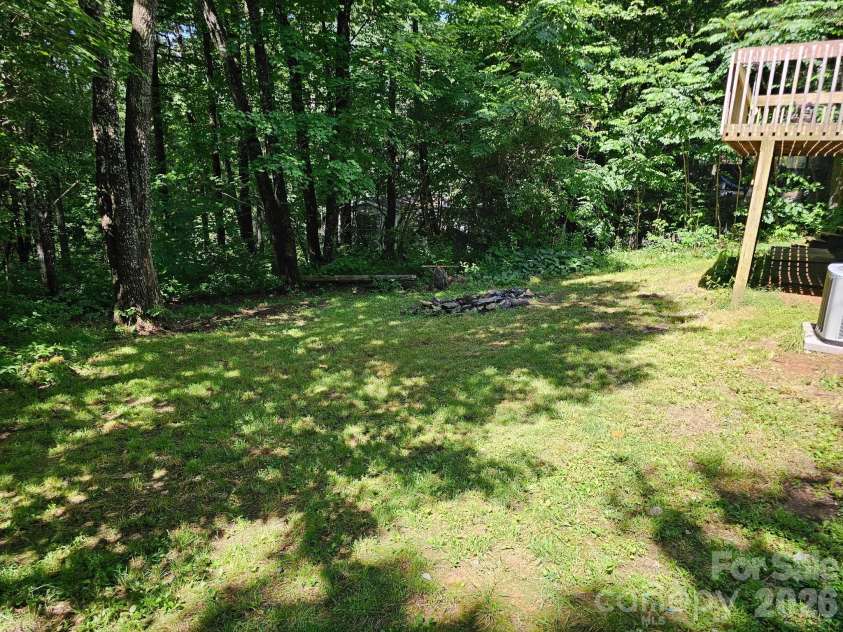 100 Squirrel Lane, Sapphire, NC 28774.  MLS# CAR4395796, YatesRealty ID 33707. 