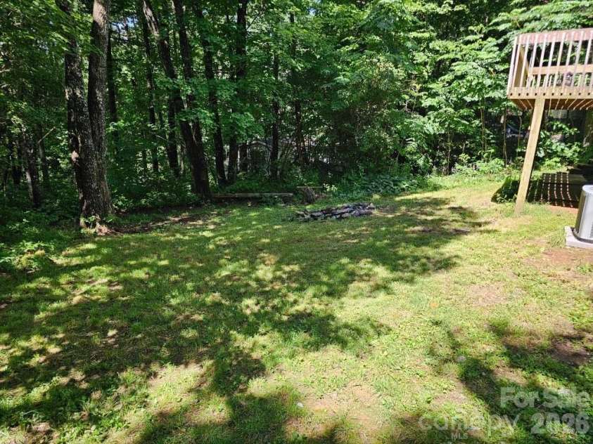 100 Squirrel Lane, Sapphire, NC 28774.  MLS# CAR4395796, YatesRealty ID 33707. 