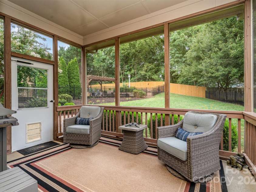 11132 Warfield Avenue, Huntersville, NC 28078.  MLS# CAR4289765, YatesRealty ID 33709. Screened-in porch