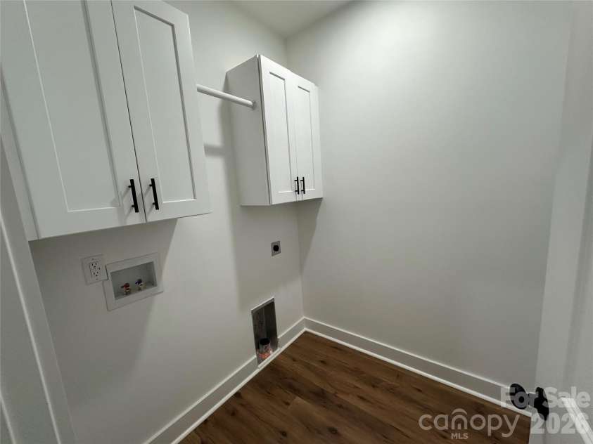 907 Orangewood Street, Kannapolis, NC 28081.  MLS# CAR4395518, YatesRealty ID 33710. Laundry Room with Cabinets