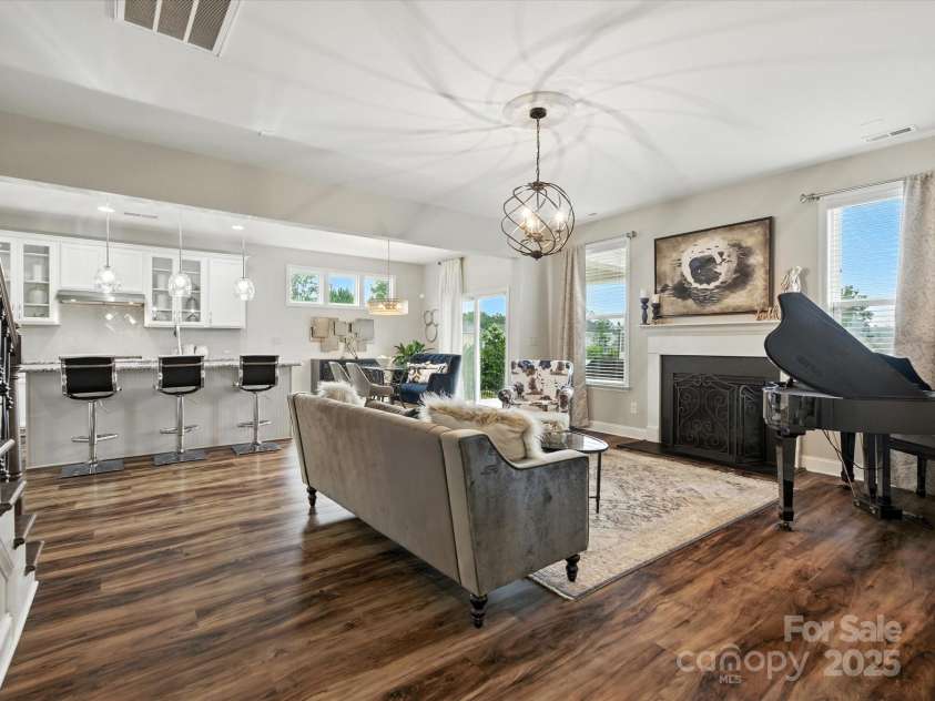 2033 Folkstone Lane, Lancaster, SC 29720.  MLS# CAR4287306, YatesRealty ID 33712. Great Room w/ Cozy Fireplace