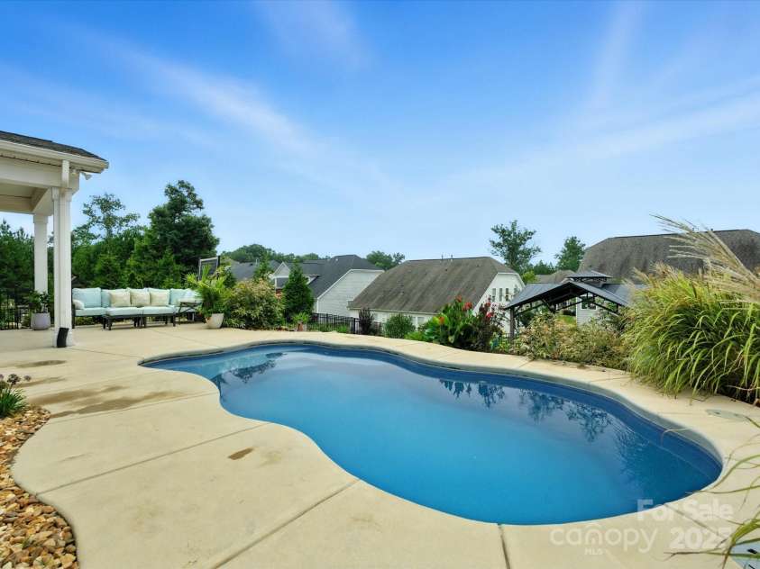 2033 Folkstone Lane, Lancaster, SC 29720.  MLS# CAR4287306, YatesRealty ID 33712. Perfect size pool to take a dip and relax.