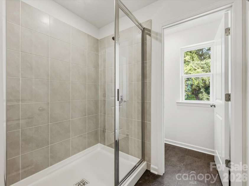 6613 Fire Lily Lane, Charlotte, NC 28216.  MLS# CAR4426558, YatesRealty ID 33719. Expansive Owner's Shower