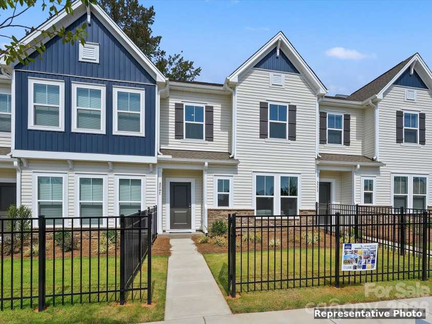 6613 Fire Lily Lane, Charlotte, NC 28216.  MLS# CAR4426558, YatesRealty ID 33719. Fenced in Front Yard for Privacy and Security
