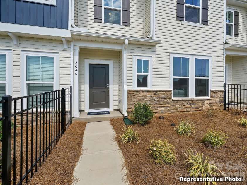 6613 Fire Lily Lane, Charlotte, NC 28216.  MLS# CAR4426558, YatesRealty ID 33719. Lawn Maintenance is Included