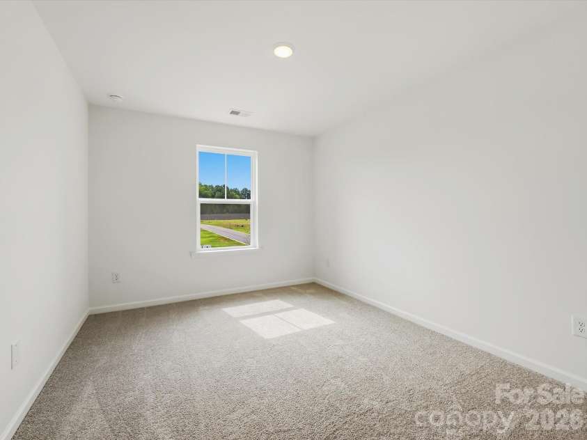6613 Fire Lily Lane, Charlotte, NC 28216.  MLS# CAR4426558, YatesRealty ID 33719. Secondary Bedroom on 2nd Floor
