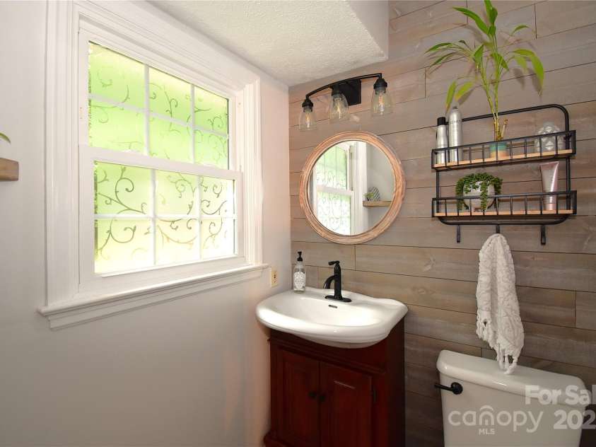 76 Melton Road, Candler, NC 28715.  MLS# CAR4289912, YatesRealty ID 33722. 