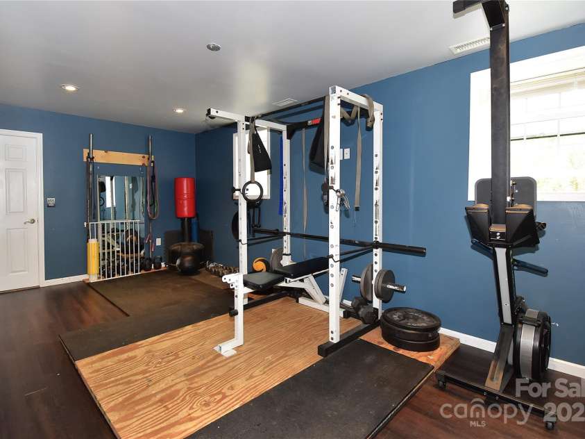 76 Melton Road, Candler, NC 28715.  MLS# CAR4289912, YatesRealty ID 33722. 