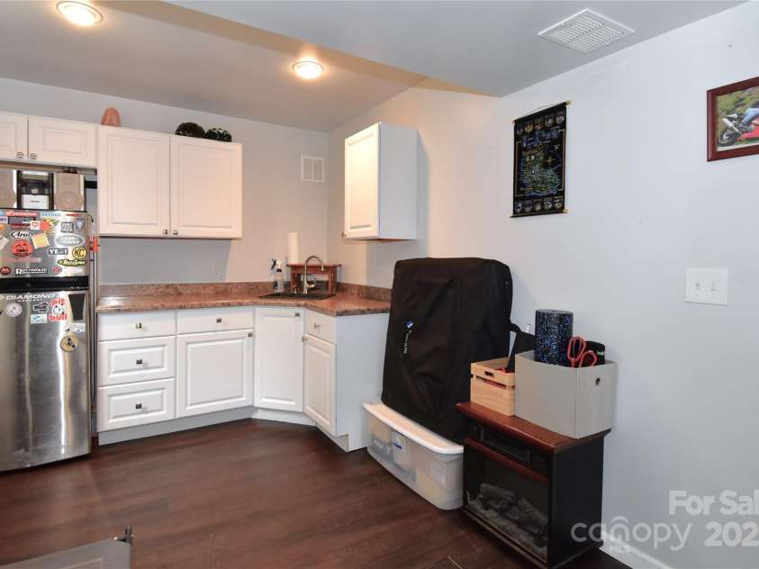 76 Melton Road, Candler, NC 28715.  MLS# CAR4289912, YatesRealty ID 33722. 