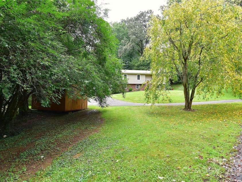 76 Melton Road, Candler, NC 28715.  MLS# CAR4289912, YatesRealty ID 33722. 
