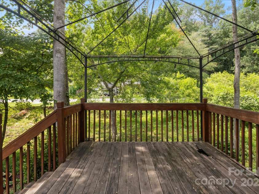 142 Pinners Cove Road, Asheville, NC 28803.  MLS# CAR4287127, YatesRealty ID 33723. Back deck.