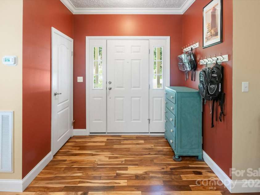 142 Pinners Cove Road, Asheville, NC 28803.  MLS# CAR4287127, YatesRealty ID 33723. Foyer and coat closet.