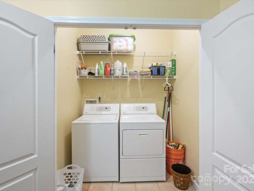 142 Pinners Cove Road, Asheville, NC 28803.  MLS# CAR4287127, YatesRealty ID 33723. Large laundry closet.