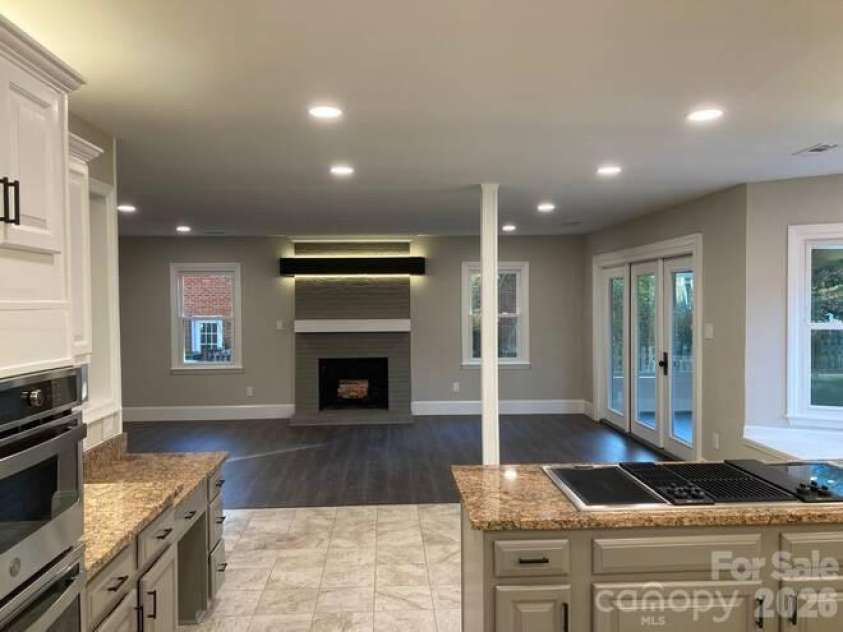 3009 Planters Walk Court, Charlotte, NC 28210.  MLS# CAR4383796, YatesRealty ID 33723. Kitchen View into Den