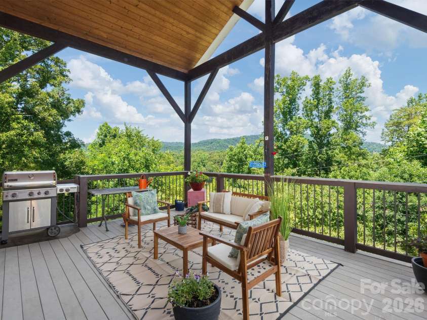 105 Upper Grove Lane, Weaverville, NC 28787.  MLS# CAR4385433, YatesRealty ID 33724. 180 degree mountain view from upper deck